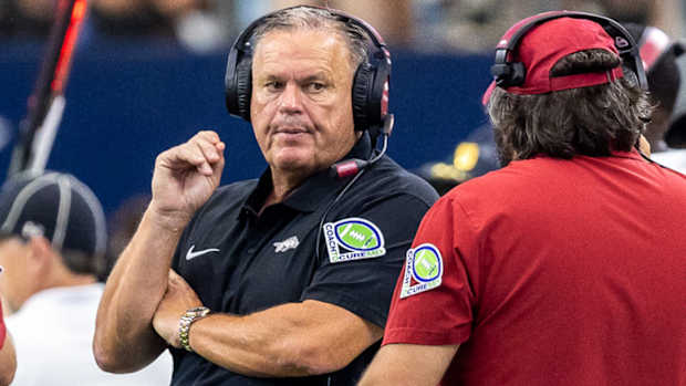 Razorbacks coach Sam Pittman looking at offensive line coach Cody Kennedy against Texas A&M